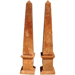 A Pair of Red Marble Obelisks