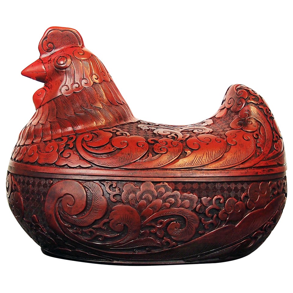 A Chinese Cinnabar Lacquer Hen Form Box