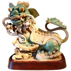 A Chinese Glazed Shiwan Pottery Foo Dog