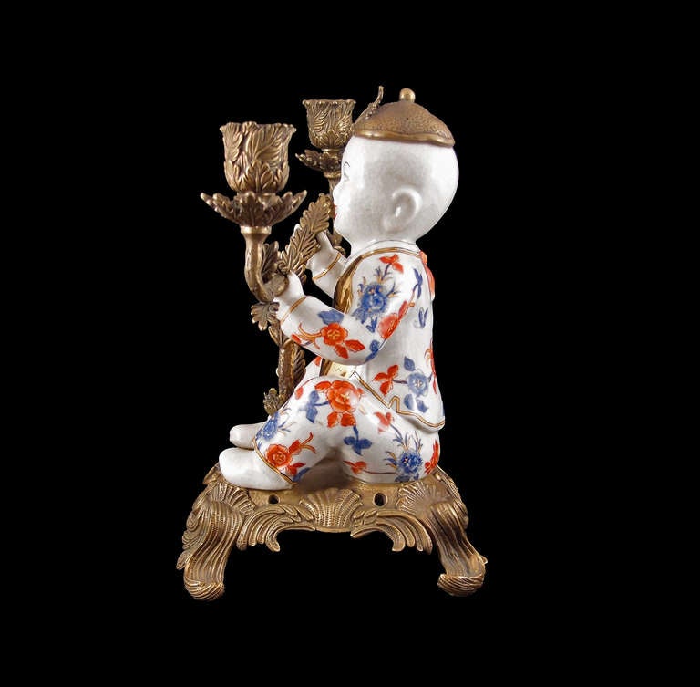Pair of Chinoiserie Figural Porcelain and Ormolu Two-Arm Candelabra In Good Condition In Austin, TX
