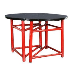 A Pair of Red and Black Lacquer Demi Lune Tables