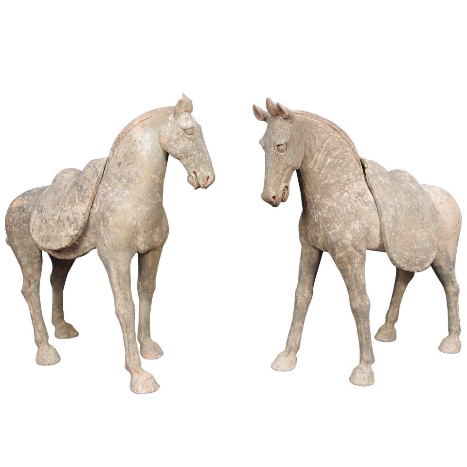 Pair of Tang Dynasty Grey Pottery Striding Horses with Removable Saddles