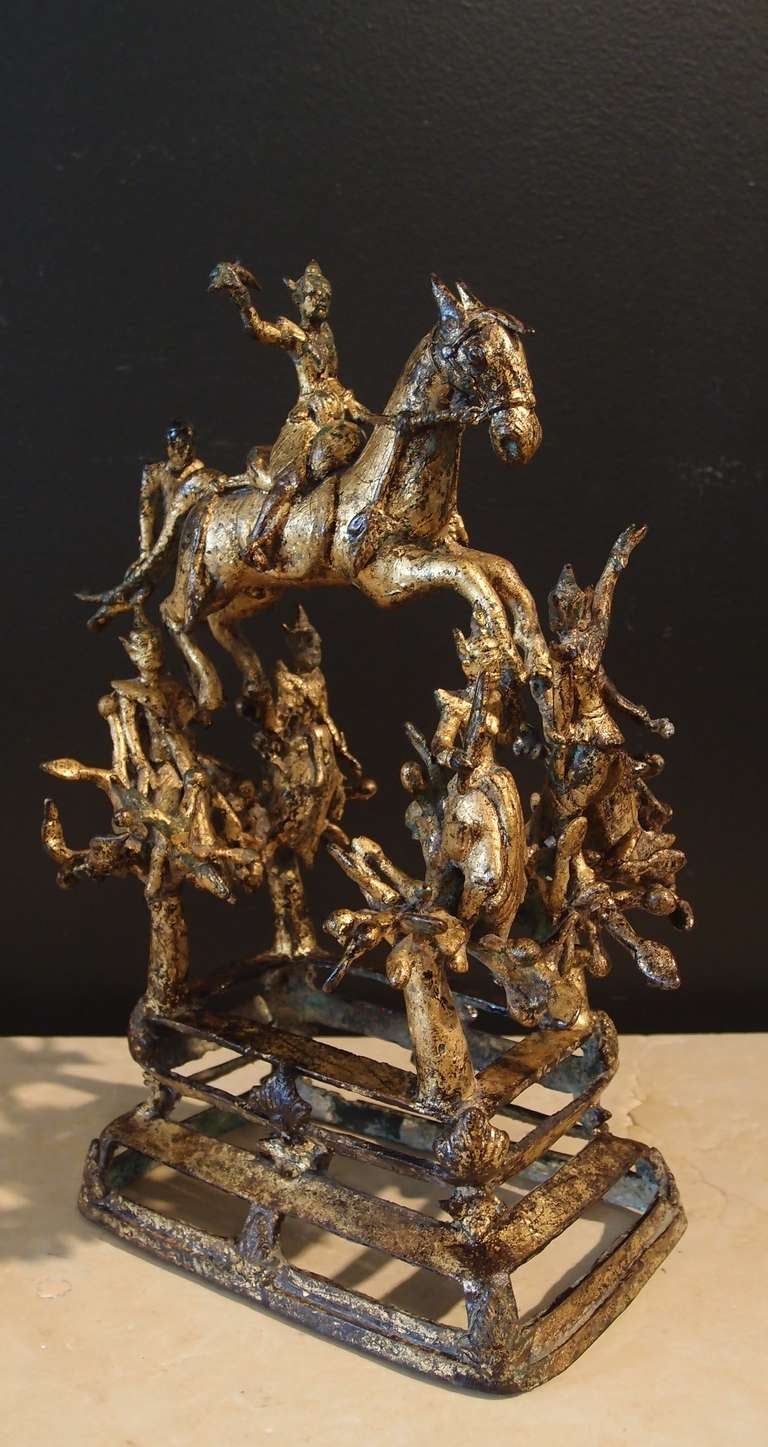 A Burmese Gilt Bronze Votive of Prince Siddartha Fleeing the Palace