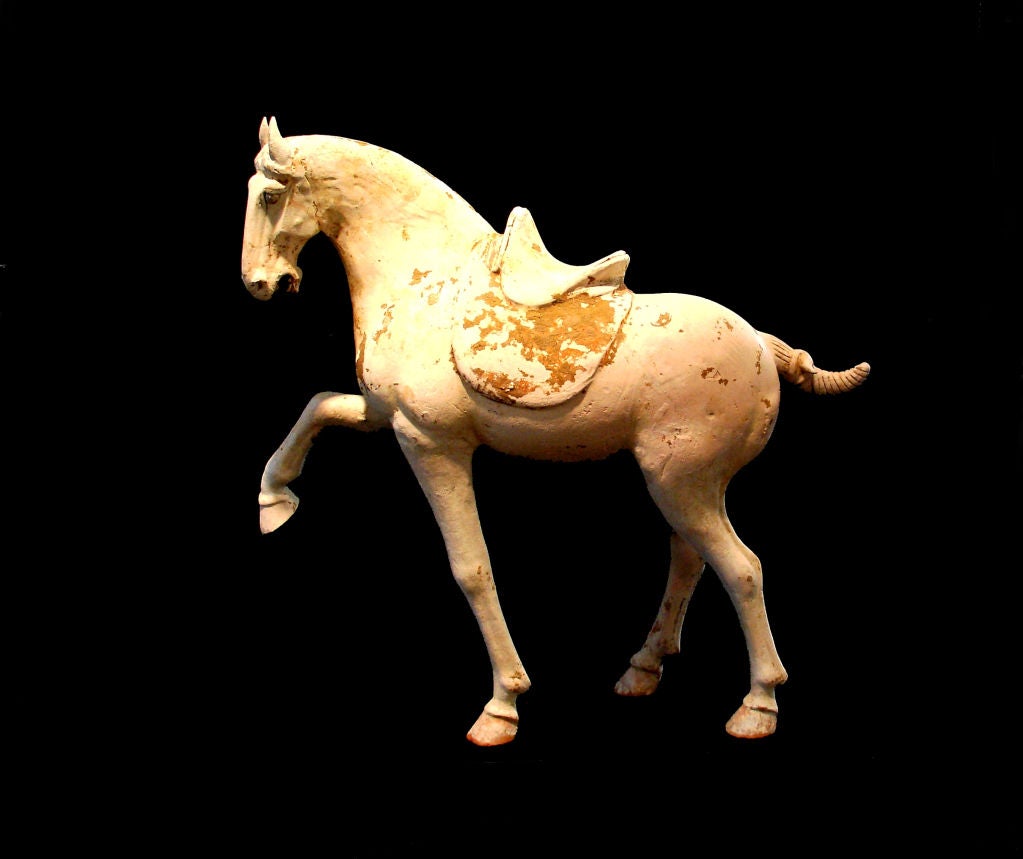 A Tang Dynasty Pottery Prancing Horse