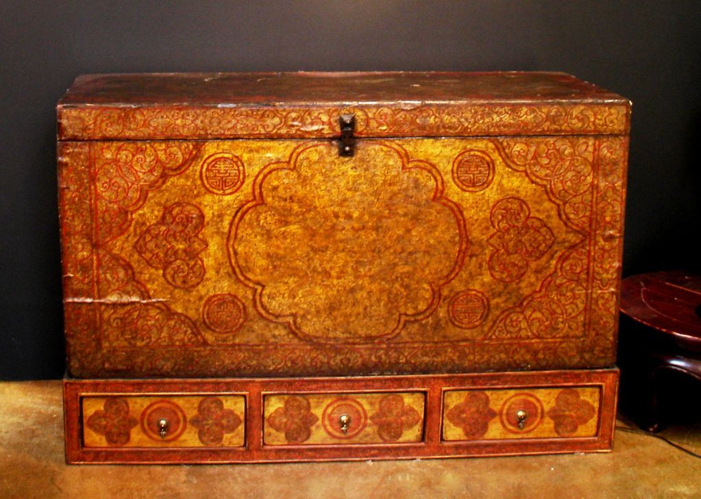 Finely painted Tibetan storage trunk featuring a stunningly painted pair of dragons surrounding the cintamani (wish fulfilling jewel) and the wheel of dharma as the central decoration. Longevity symbols and floral motifs complete the design. The
