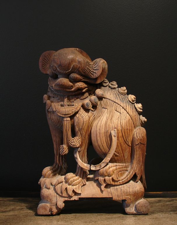 A Pair of Chinese Wooden Foo Dogs