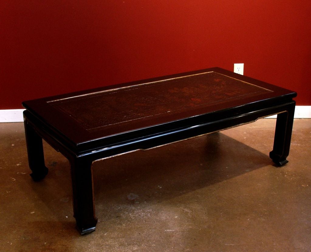 A Chinoiserie coffee table in black lacquer incorporating an 18th century Chinese lacquer and painted door panel. The painting on the panel features birds amongst branches and displays a wonderful cracked texture from age. 



Custom-made by