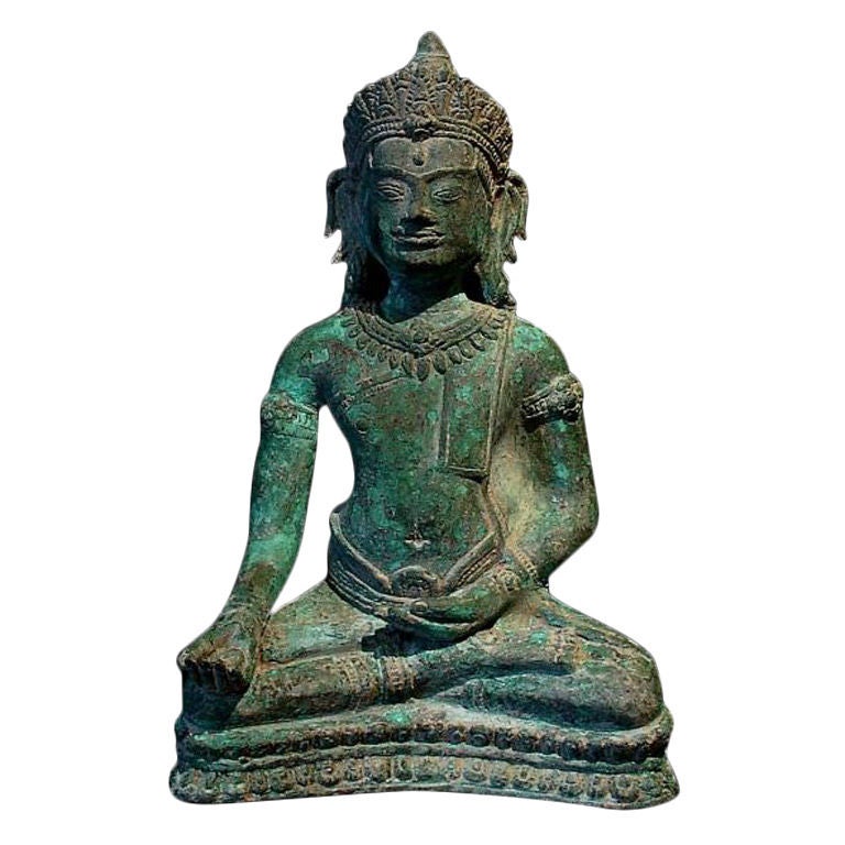 A Khmer-Lopburi Bronze Figure of an Adonrned Buddha