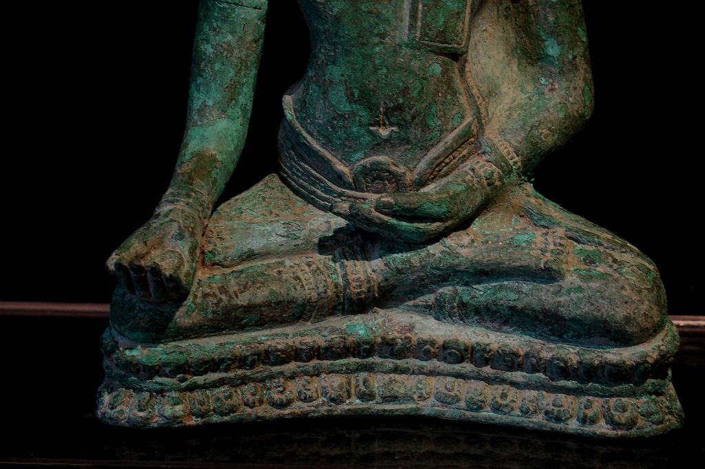 A Khmer-Lopburi Bronze Figure of an Adonrned Buddha 2