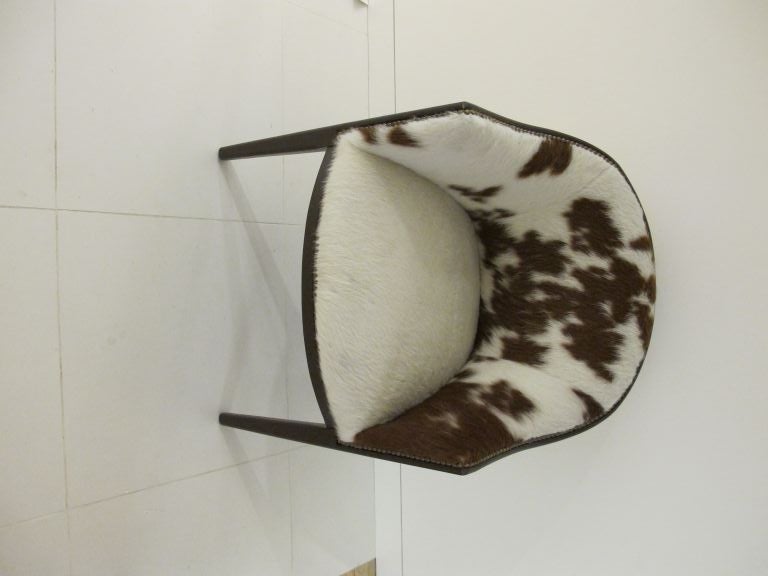 Pair of Arched Back Chairs Upholstered In Cowhide