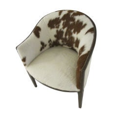 Pair of Arched Back Chairs Upholstered In Cowhide
