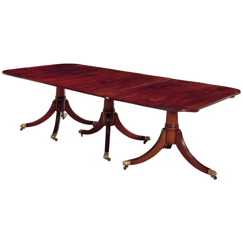 An English Mahogany Triple Pedestal Dining Table, 20th Century
