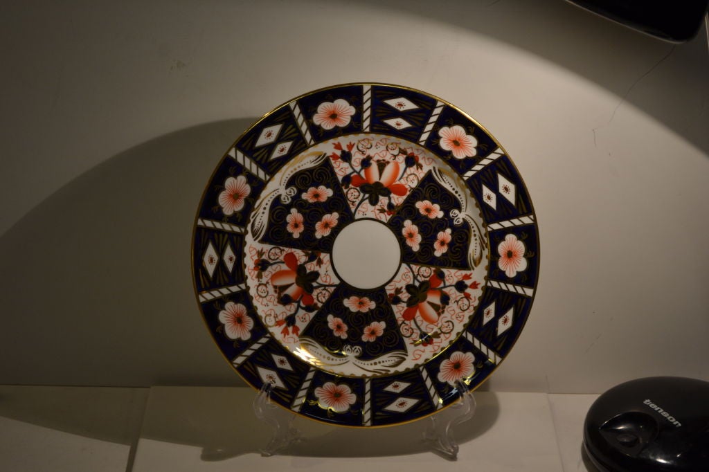 We have a set of eight of these salad or dessert plates made around 50 years ago.  The pattern is called Traditional Imari, #2451.