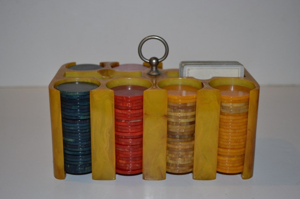 This is a very complete set of Bakelite poker chips in four wonderful colors.
