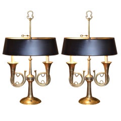Pair of brass lamps made by Chapman