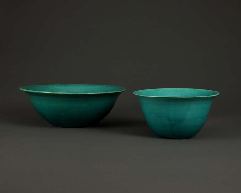 A beautiful pair of turquoise bowls by designer Jean Bernard, French, 1925 - 1930.

One is signed by the designer Jean Bernard on the bottom.