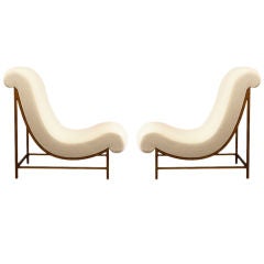 A pair of Roger Thibier armchairs