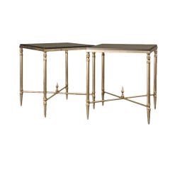 A pair of small Maison Jansen tables