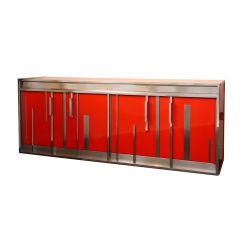 A red lacquer cabinet by Luigi Moretti