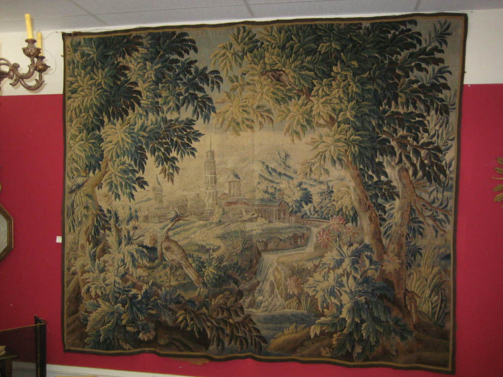 This is a really large very fine aubisson I purchased in France.  The subject matter if of a Chateau with several birds in the trees surrounding the view.