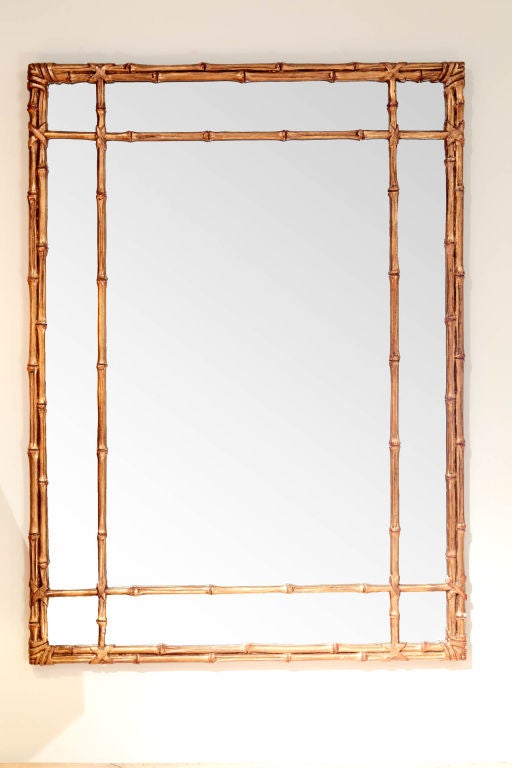 Well modeled 1950s Gilded Carved Wood Faux Bamboo Wall Mirror