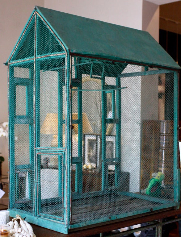 Charming Antique Green painted Wire Mesh Birdcage with Wooden Frame, slatted Floor and Metal Roof centered by a Clock Tower