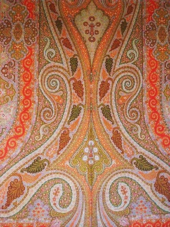 A magnificent loomed French paisley piano shawl, this signed piece presents a display of spectacular color and shape; a highlight for any collectors interior.