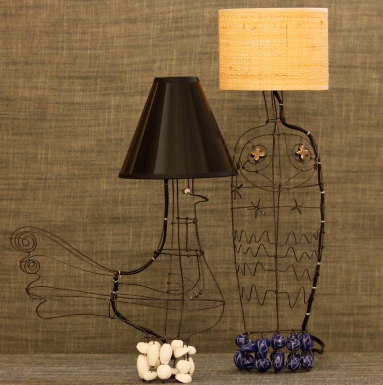 Marie Christophe Petit Hibou Lamp w/ Blue Ceramic Beads and Raffia Shade.<br />
15 W candelabra bulb<br />
<br />
Also Shown:<br />
Marie Christophe Dove Lamp, Poisson Lamp and Serpent Lamp.<br />
<br />
Specific is proud to offer the