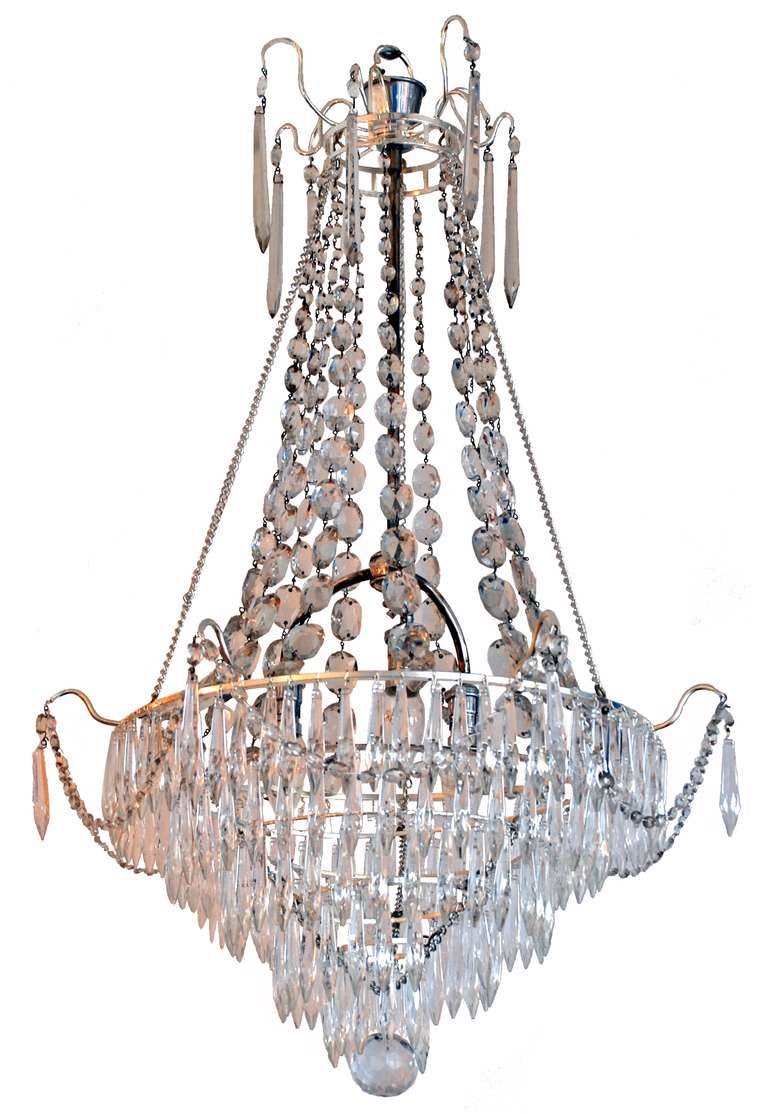 A pair of Gustavian style three light chandeliers 