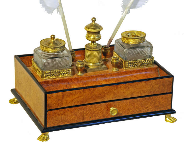Desk set with a drawer, candle holder with a lid, two cut glass containers: one for ink the other for sand and four holders for quills