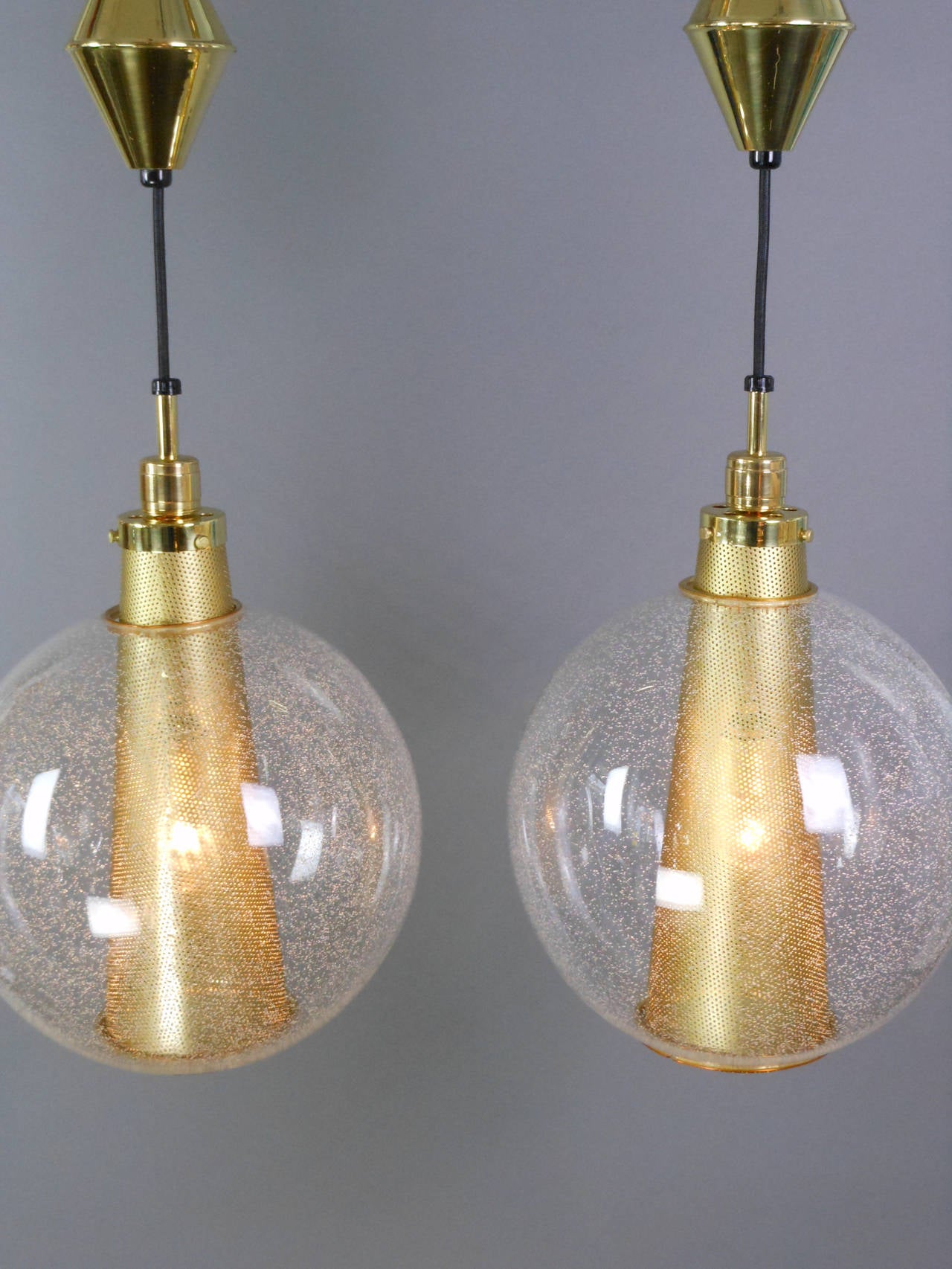 Pair of Glass and Brass Globe Chandeliers In Good Condition In New York, NY