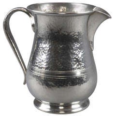An English Pewter Jug by Archibald Knox for Liberty