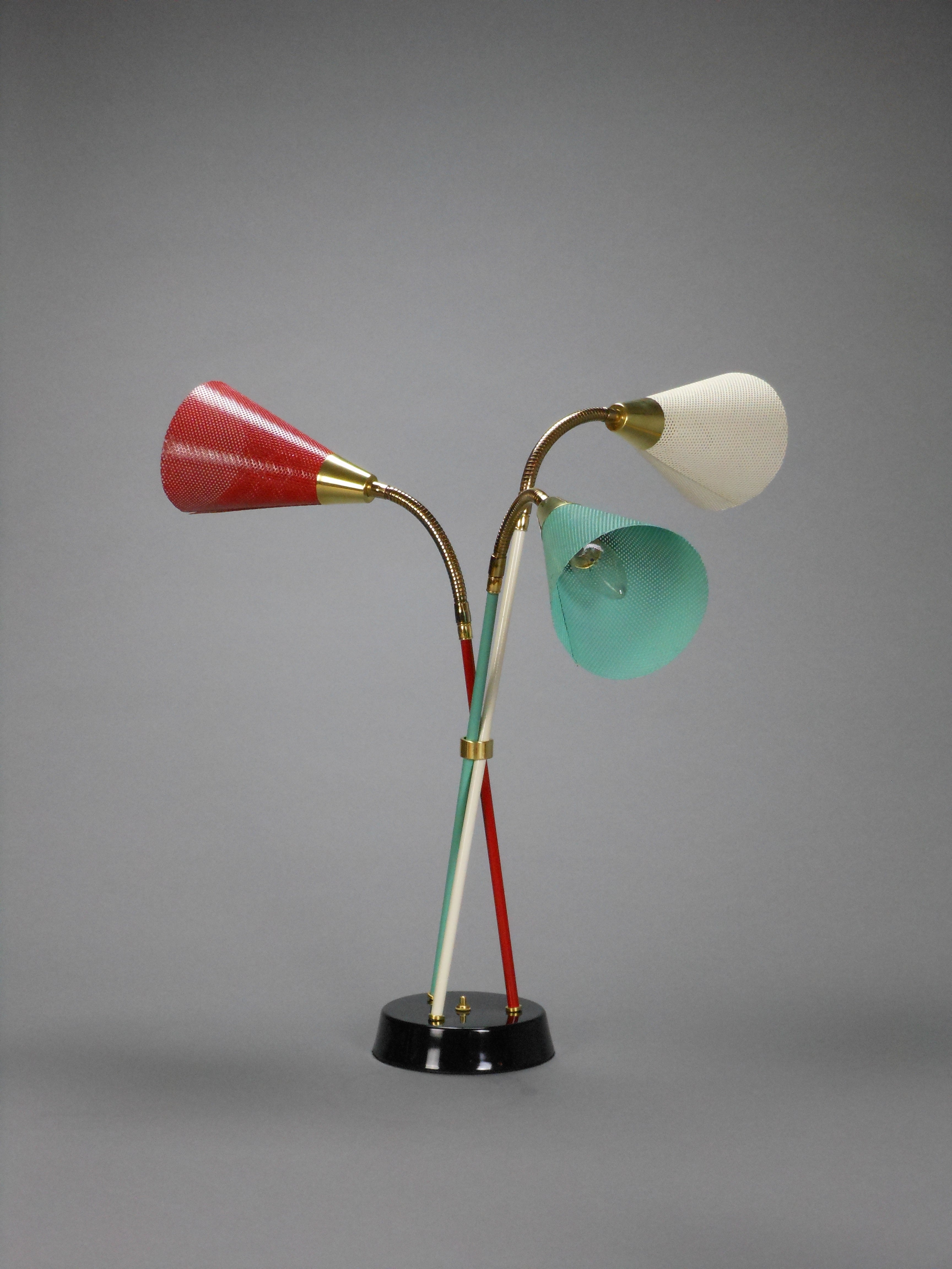 A 3-Light Polychrome and Brass Table Lamp with Perforated Shades