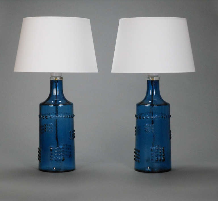 Each of bottle form punctuated with low-relief dot patterns.

Height to light fitting:  15