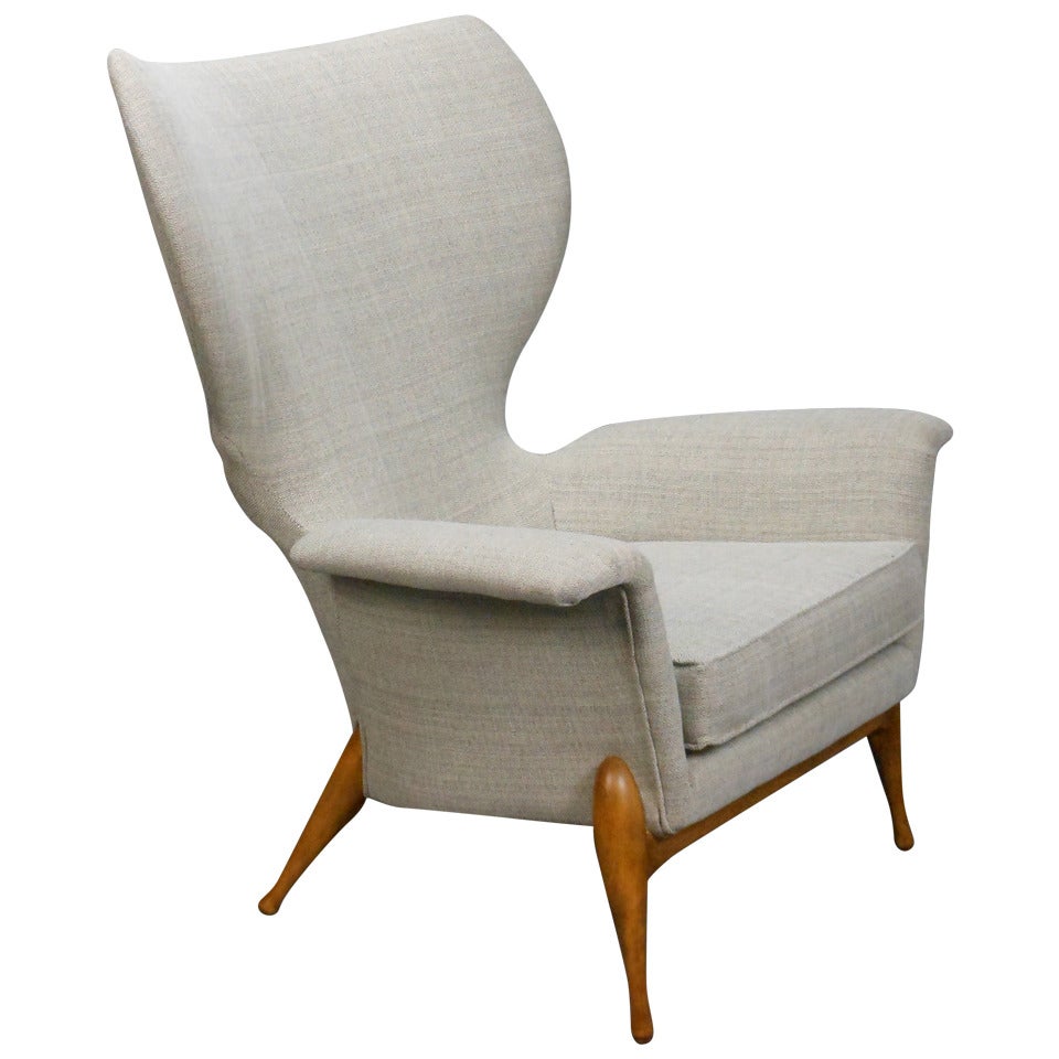 A Continental Upholstered Wing Chair