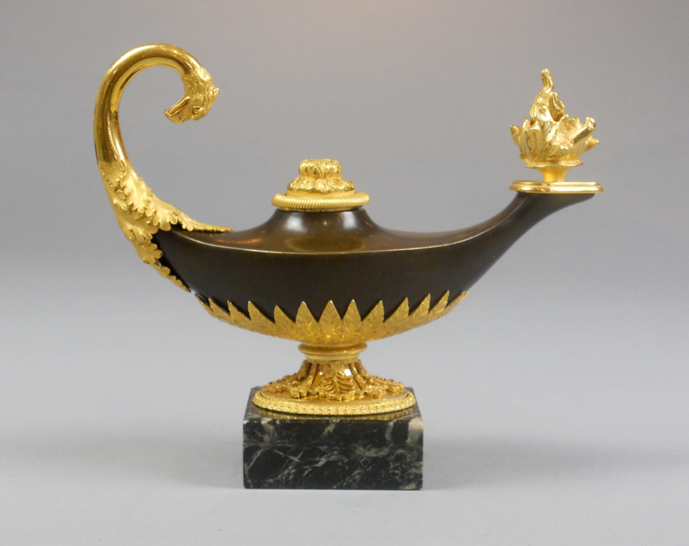 French Empire Gilt and Patinated Bronze Candlestick in the Form of an Oil Lamp For Sale