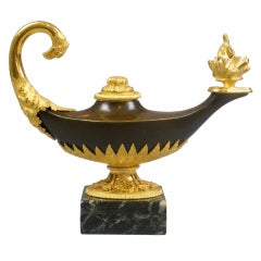 French Empire Gilt and Patinated Bronze Candlestick in the Form of an Oil Lamp