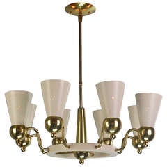 An American Brass and Cream Eight-Light Chandelier