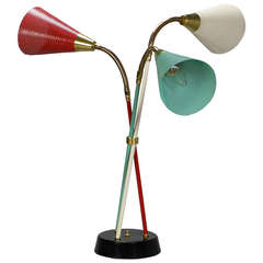 A 3-Light Polychrome and Brass Table Lamp with Perforated Shades