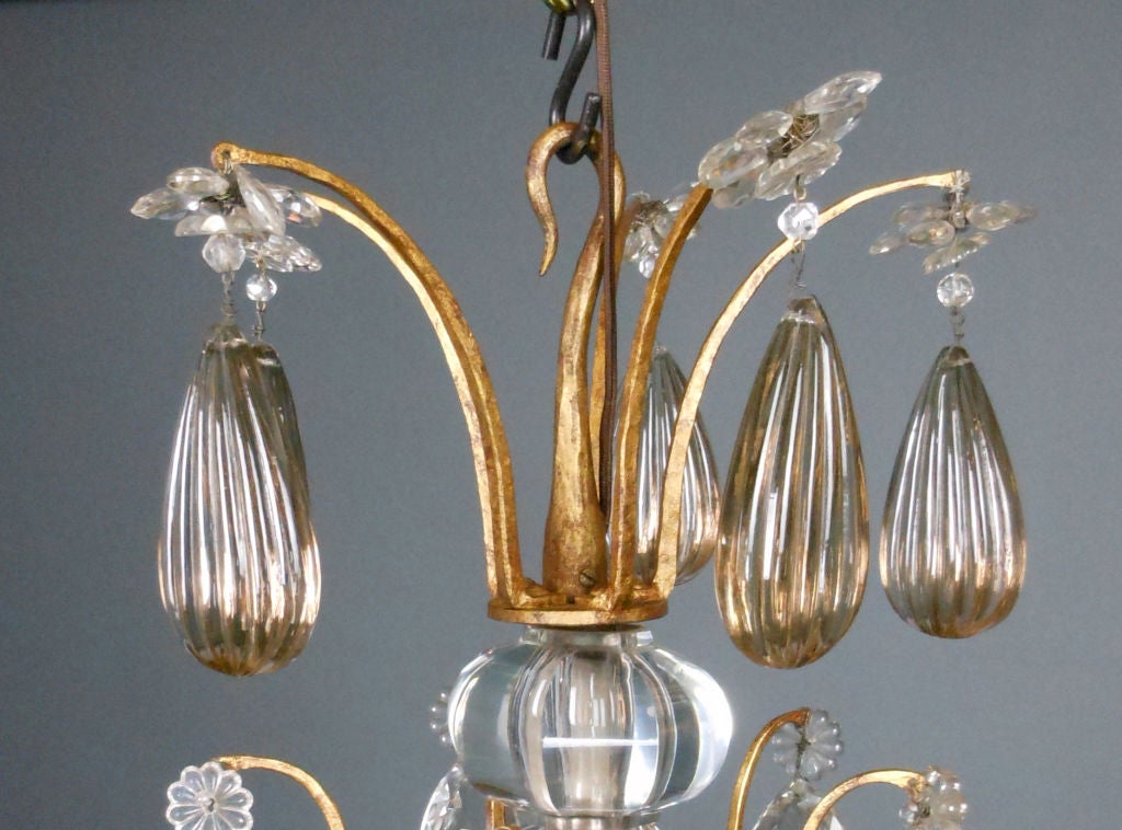 A French Gilt Iron and Cut Crystal Chandelier In Good Condition For Sale In New York, NY