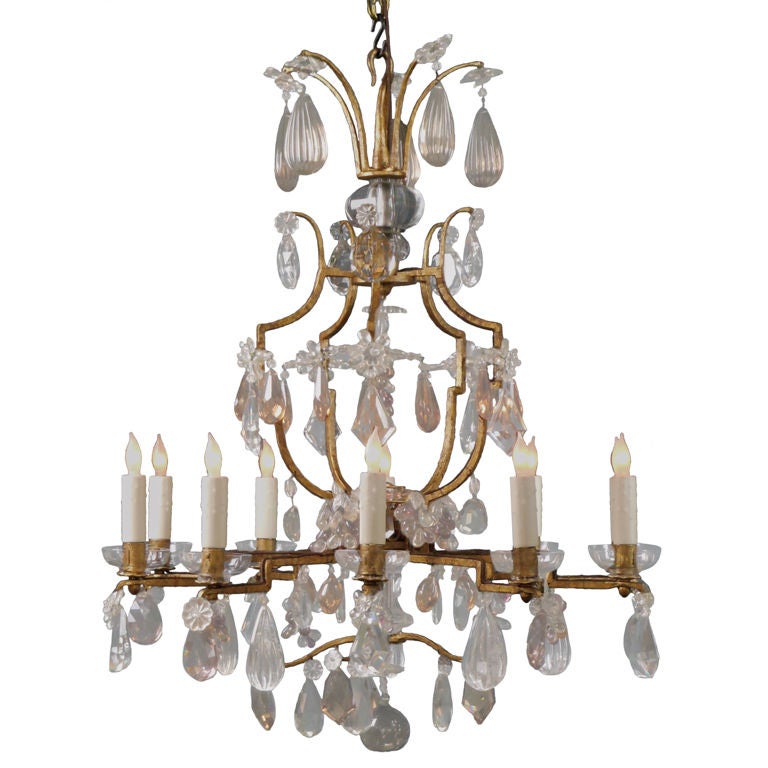 A French Gilt Iron and Cut Crystal Chandelier For Sale