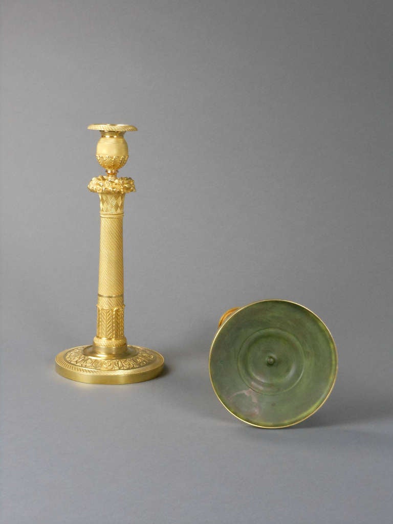 19th Century Neoclassical Pair of French Gilt Bronze Candlesticks For Sale