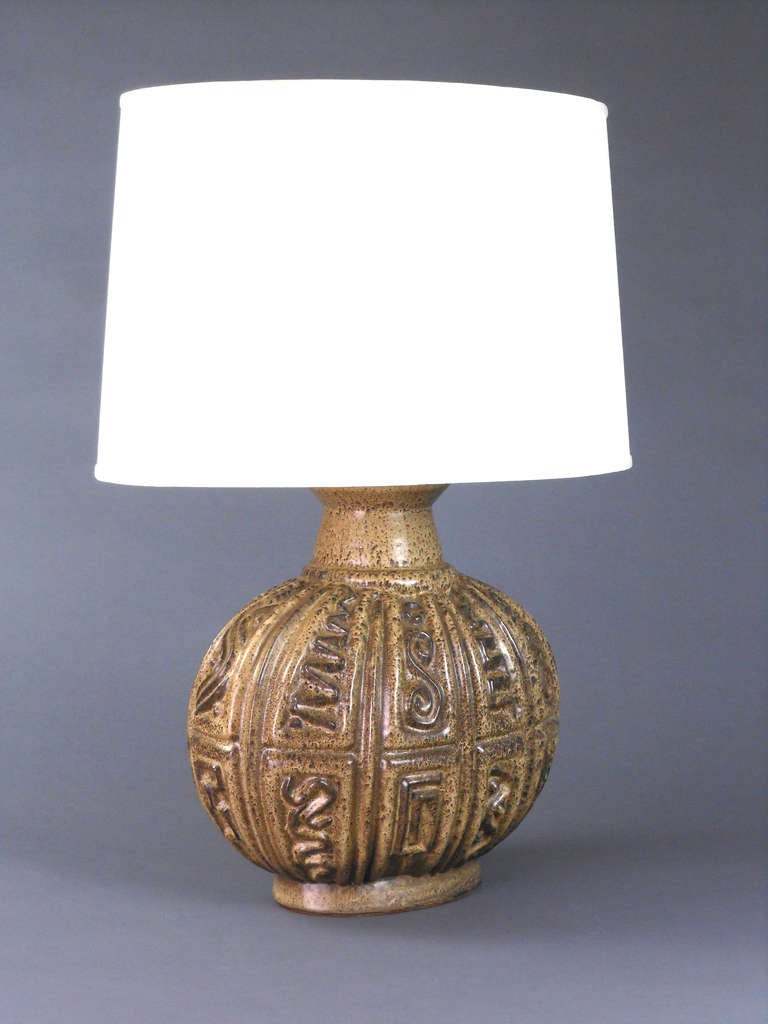 Northern European ceramic lamp with low relief geometric design. Measure: Height to base of light socket 15