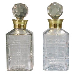 A Pair of French Brass Mounted Cut Crystal Decanters
