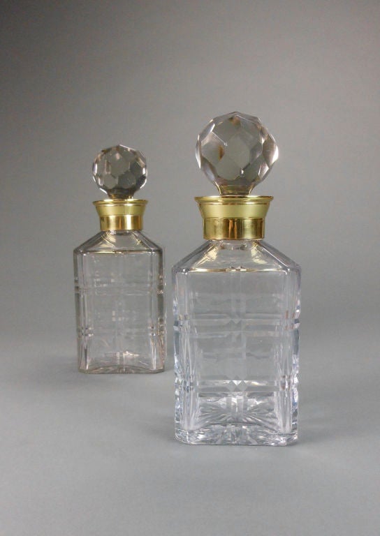 A Pair of French Brass Mounted Cut Crystal Decanters 1