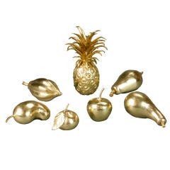A French Set of Seven Pieces of Brass Fruit