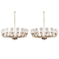 A Pair of Continental Brass 16 Arm Chandeliers