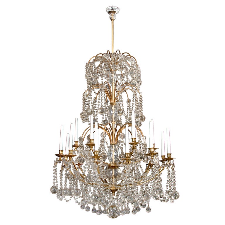 A French Gilt Bronze and Cut Glass 18 Light Chandelier For Sale