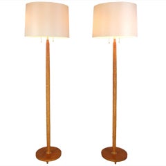 A Pair of Danish Brass Mounted Leather Floor Lamps