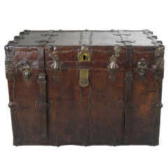 A Large Brass Mounted Leather Trunk